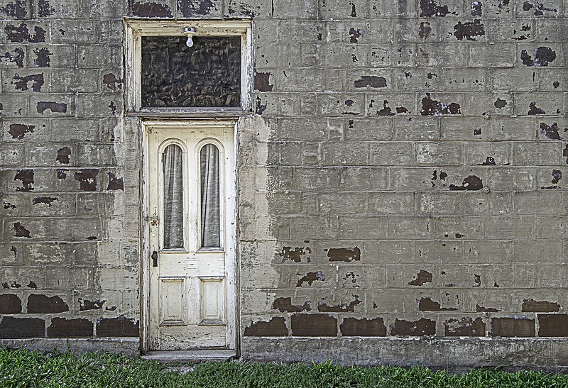 Side door to a large building.